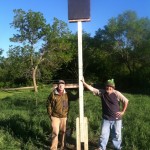 Mike Rewey and Paul Noeldner post with the first bat house in Warner Park. (Tim Nelson)