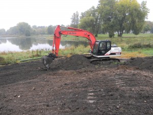 Crews from the Madison Parks Department worked for two weeks to excavate the hill, and haul it to Cherokee Marsh.