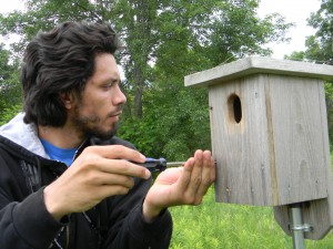 Jonathan Santanna opens a next on Warner Park's Blue Bird Trail. (Trish O'Kane)